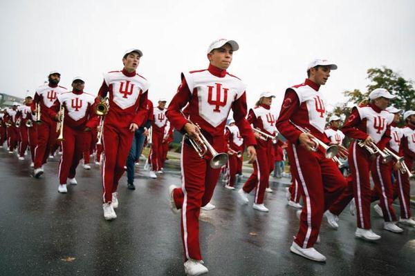 Marching band performing in a parade at IU Bloomington.