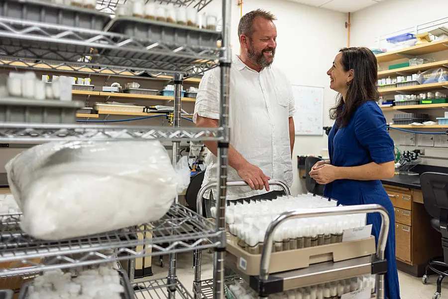 Married neuroscientists Orie Shafer and Maria de la Paz Fernandez gaze at one another in their research lab dedicated to advancing understanding of how the brain's internal clock works.