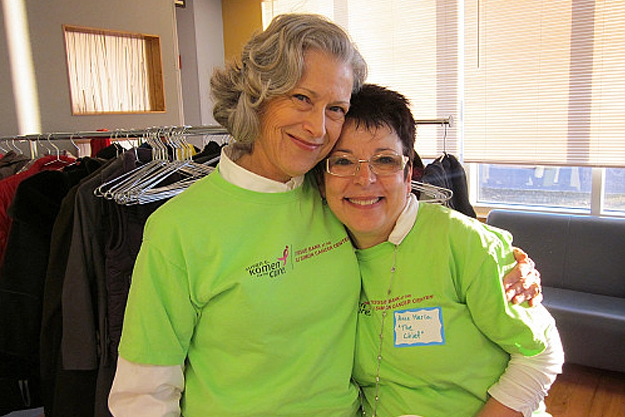 Connie Rufenbarger (left) and Dr. Anna Maria Storniolo pose with arms around each other during a Komen Tissue Bank donation event in 2010.