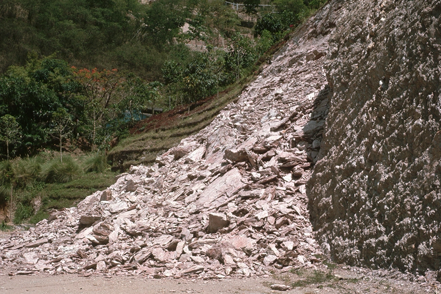 landslide of rocks on the side of a hill